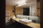 moderner Badezimmer mit Holzdetails und Waschbecken